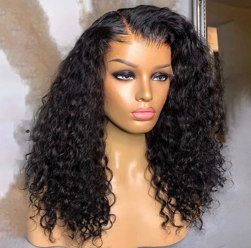 4x 4 lace closure deep wave Brazilian hair wig 14 “